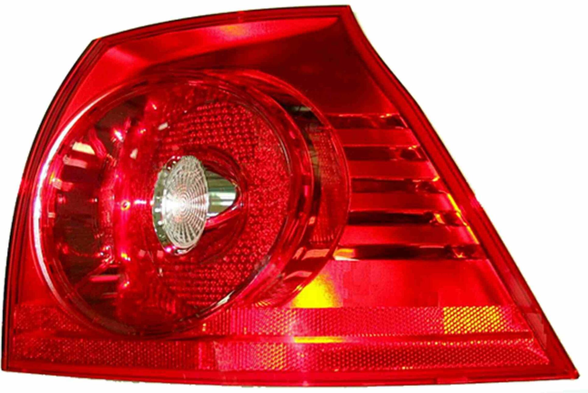 VW Tail Light Assembly - Passenger Side Outer 1K6945096A - Hella 010174021